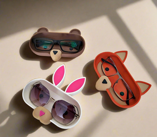 Glasses holder in the shape of a bunny, a fox, and a bear