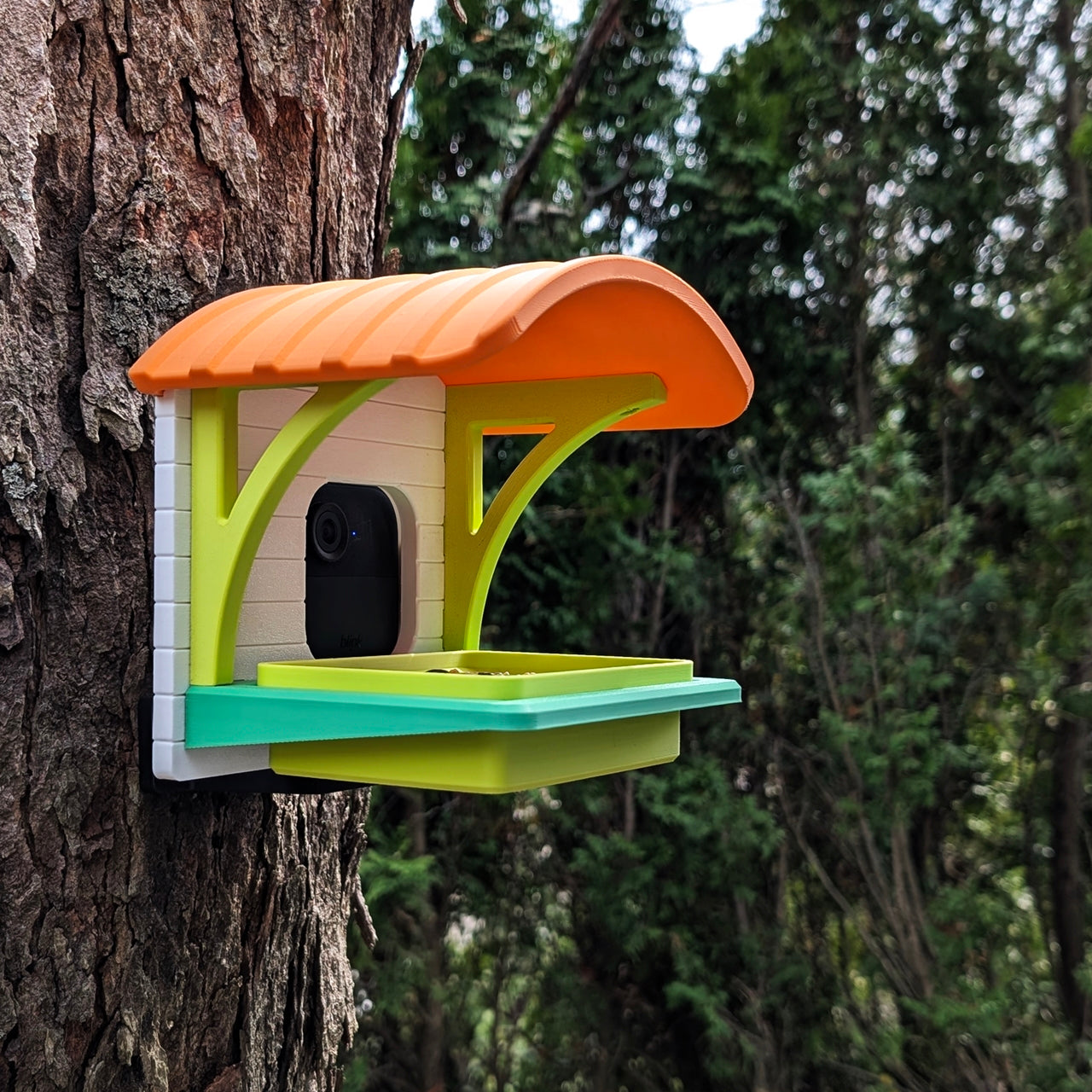 Birdfeeder with slot for security camera to watch birds