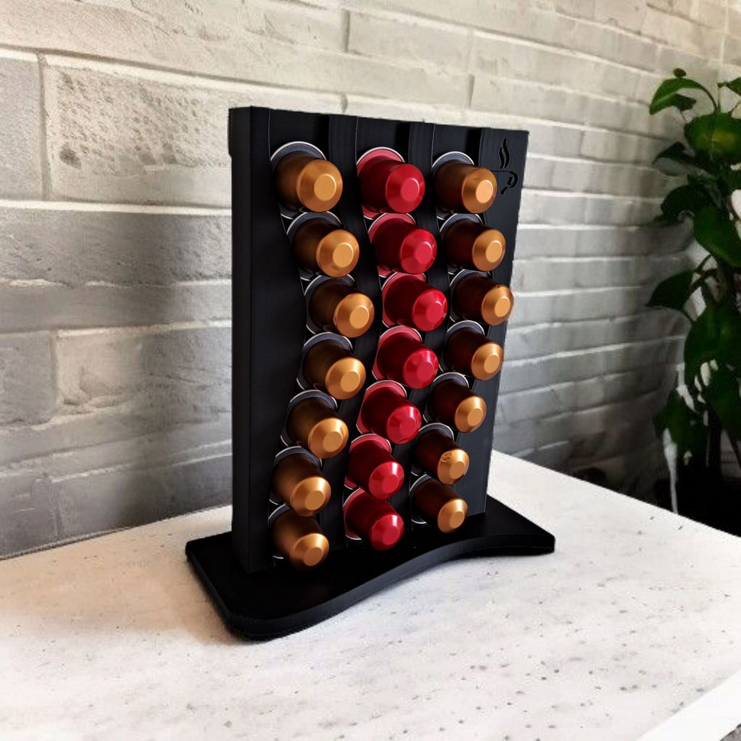 Nespresso coffee pod holder on a granite countertop