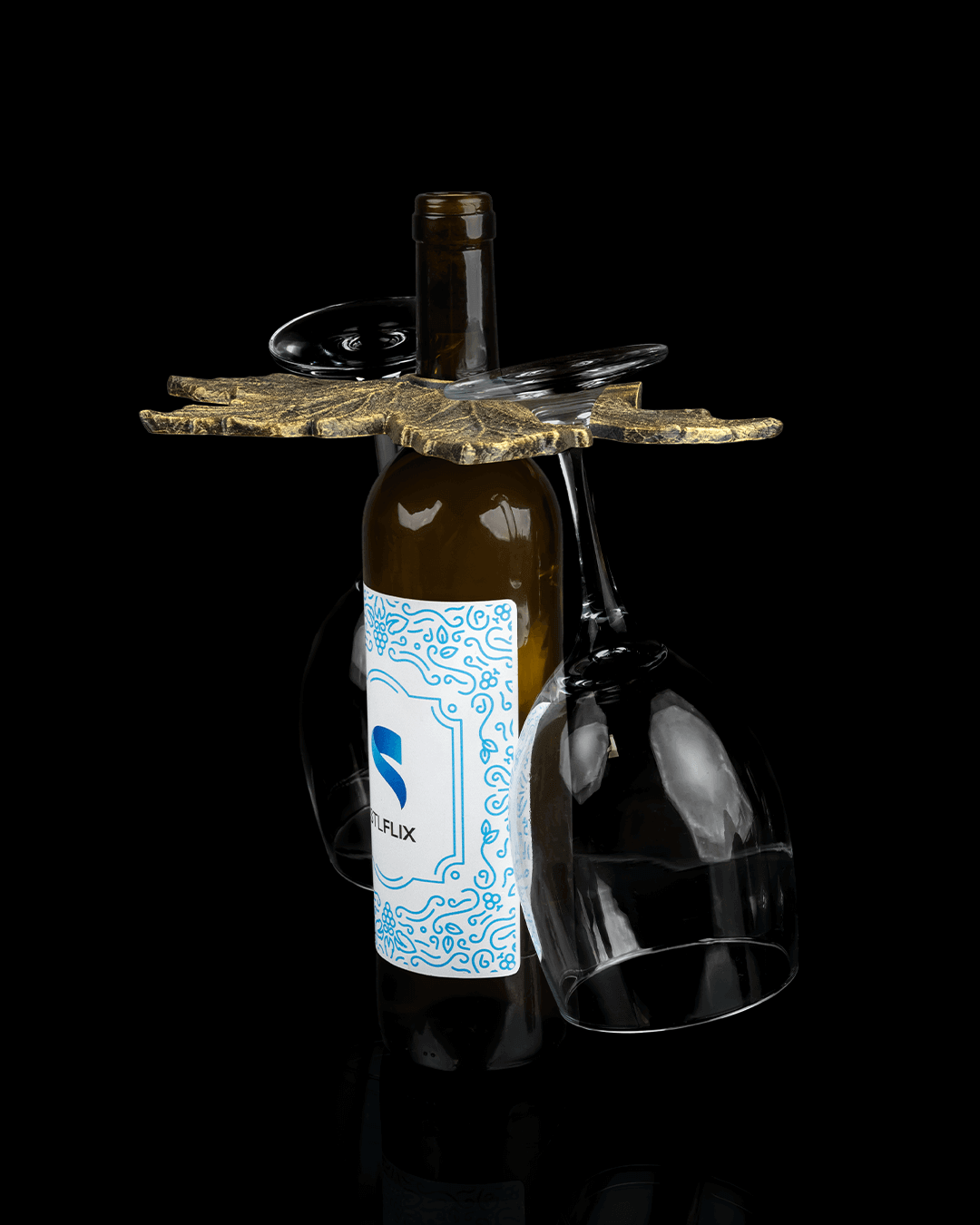 Elegant leaf wine glass holder showcasing wine bottle and glasses, perfect for wine enthusiasts and fall decor.