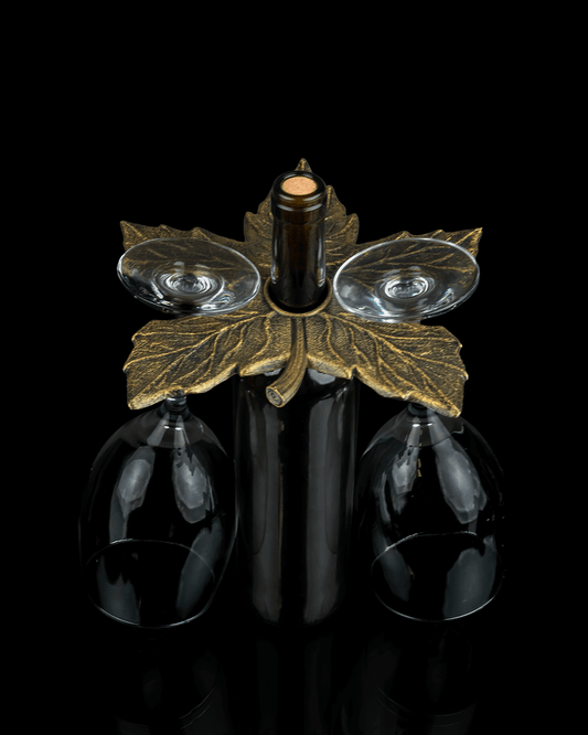 Elegant leaf-shaped wine glass holder showcasing wine and glasses, perfect for fall decor and wine lovers.