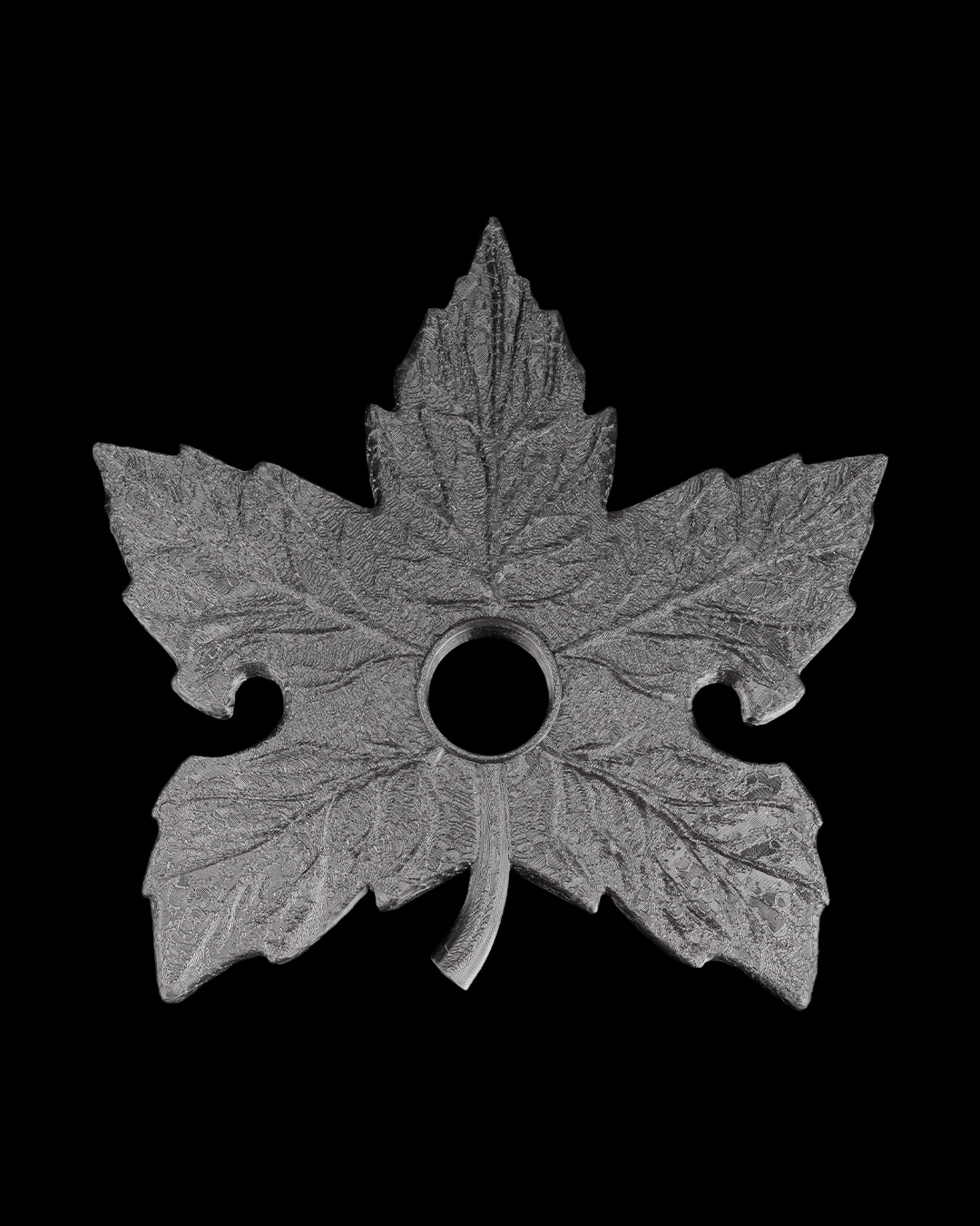 Leaf-shaped wine glass holder in brushed silver finish, perfect for wine enthusiasts and fall decor.