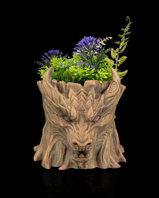 Dragon Stump Planter showcasing a detailed dragon head design with vibrant artificial plants for whimsical garden décor.