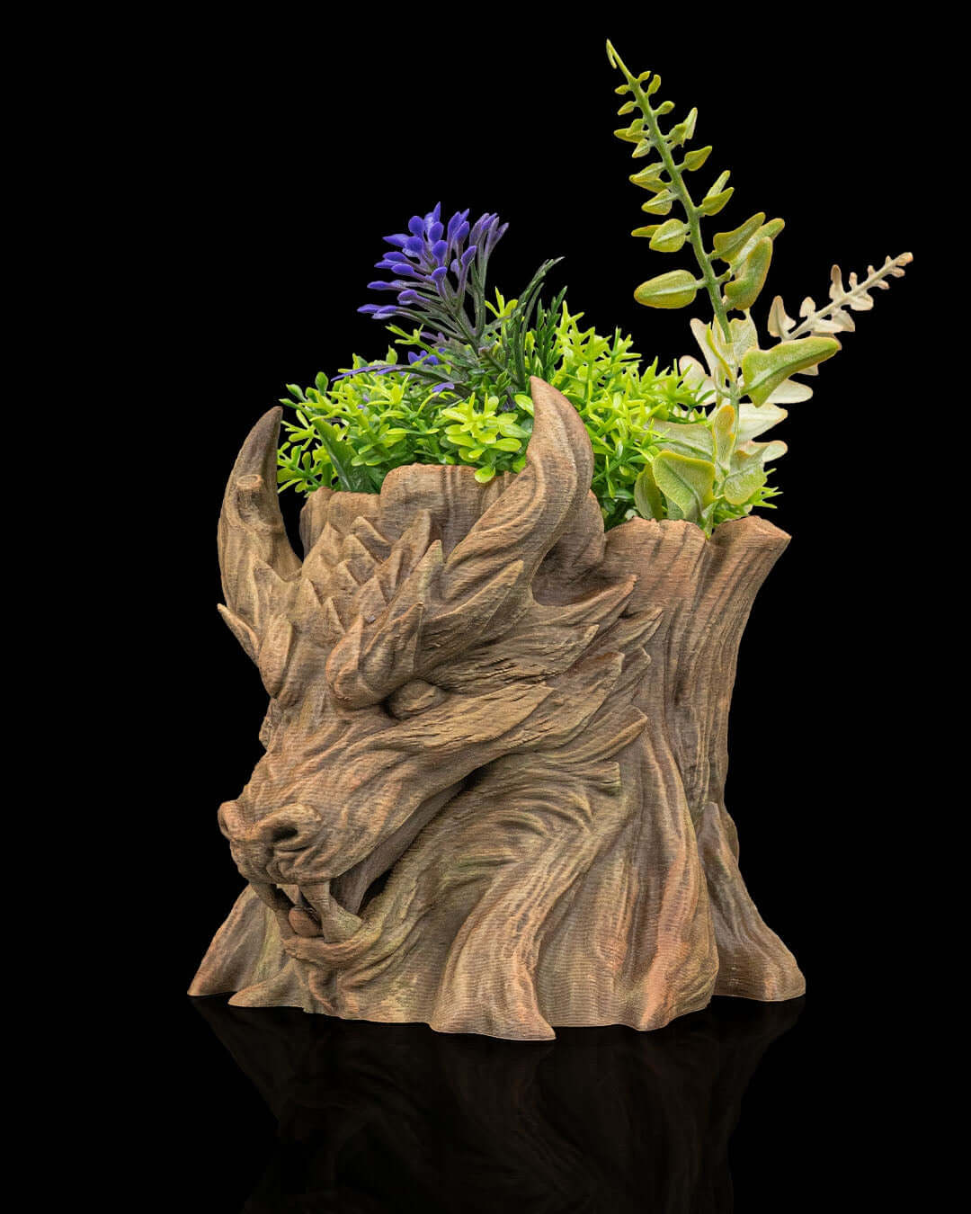 Dragon Stump Planter featuring a detailed dragon head with assorted greenery for eco-friendly home decor.